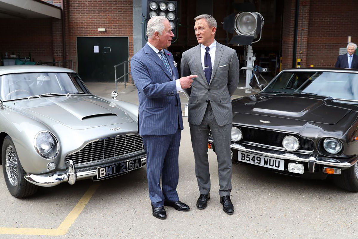 Prince Charles and David Craig as James Bond visit Aston Martin site