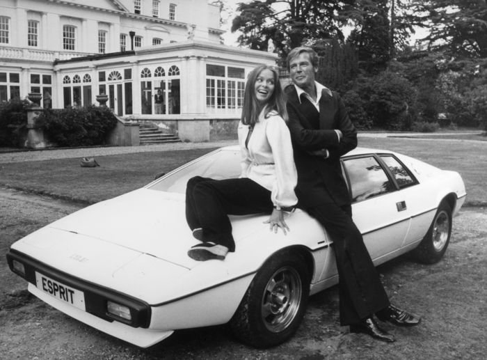 Sean Connory & Barbara Bach posing with a Lotus Esprit E1